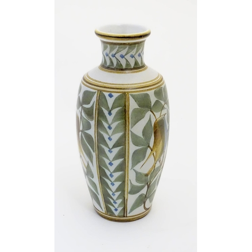 98 - A Laurence McGowan British studio pottery vase decorated with blue bellied birds and foliage. Monogr... 