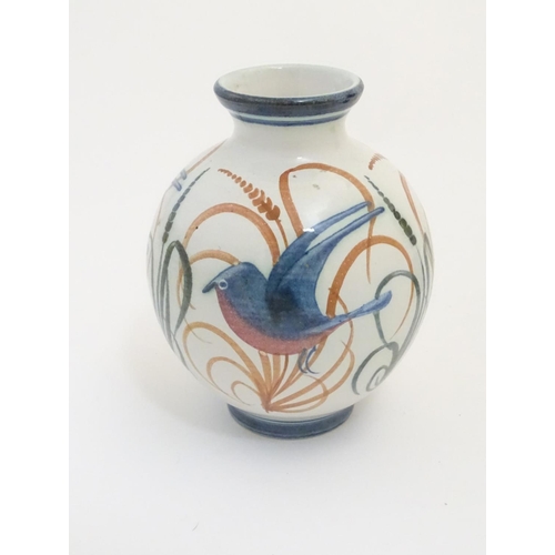 99 - A Laurence McGowan British studio pottery globular vase decorated with hand painted birds in flight ... 