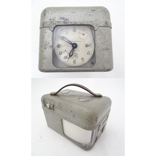 109 - Pigeon Racing : a STB Master Timer Pigeon Racing Clock with aluminium case and leather carry strap.