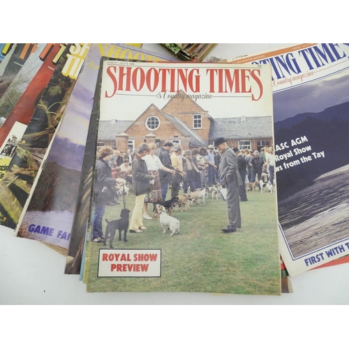 11 - Two boxes of vintage magazines, to include a large quantity of the 'Shooting Times' dating from 1962... 