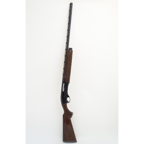 500 - Shotgun: a Remington 'Model 1100' 12 bore semi-automatic sporting gun. 28'' barrel with raised venti... 