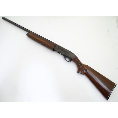 500 - Shotgun: a Remington 'Model 1100' 12 bore semi-automatic sporting gun. 28'' barrel with raised venti... 