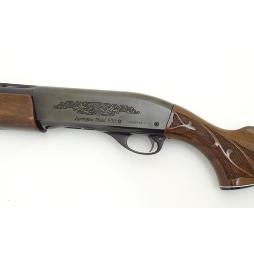 500 - Shotgun: a Remington 'Model 1100' 12 bore semi-automatic sporting gun. 28'' barrel with raised venti... 