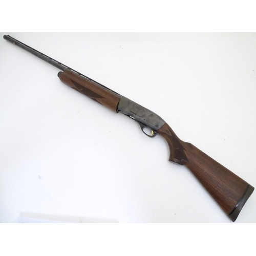 502 - Shotgun: a Remington '11-87 Premier' 12 bore semi-automatic sporting gun, 28'' multichoke barrel wit... 