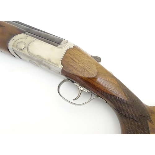 505 - Shotgun: a Marocchi/Classic Doubles 'Model 92' 12 bore over & under sporting gun. 30'' multichoke ba... 