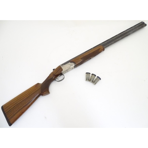 506 - Shotgun: a continental 12 bore over & under sporting gun by S. Pedretti, Gardone, Italy.  28'' multi... 