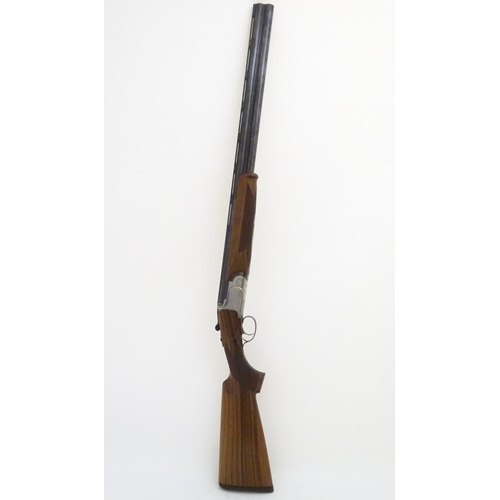 506 - Shotgun: a continental 12 bore over & under sporting gun by S. Pedretti, Gardone, Italy.  28'' multi... 