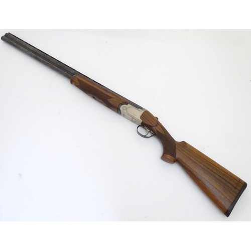 506 - Shotgun: a continental 12 bore over & under sporting gun by S. Pedretti, Gardone, Italy.  28'' multi... 