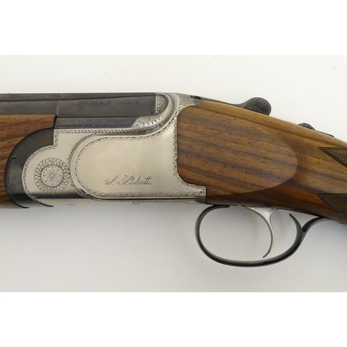 506 - Shotgun: a continental 12 bore over & under sporting gun by S. Pedretti, Gardone, Italy.  28'' multi... 