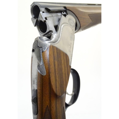 506 - Shotgun: a continental 12 bore over & under sporting gun by S. Pedretti, Gardone, Italy.  28'' multi... 