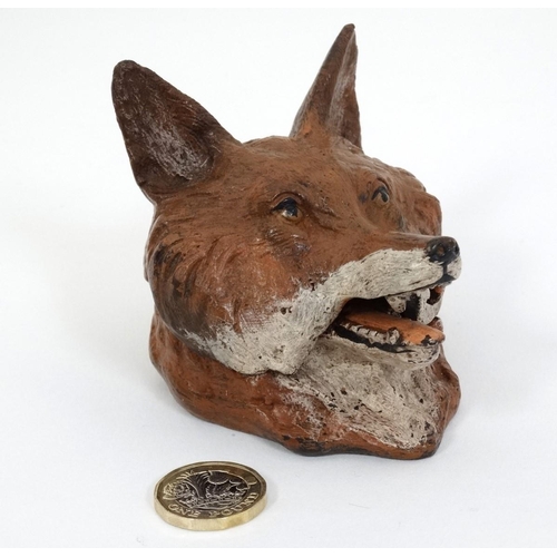 86 - A Novelty cold painted bronze inkwell formed as a fox head. 21stC. 3 1/2'' long