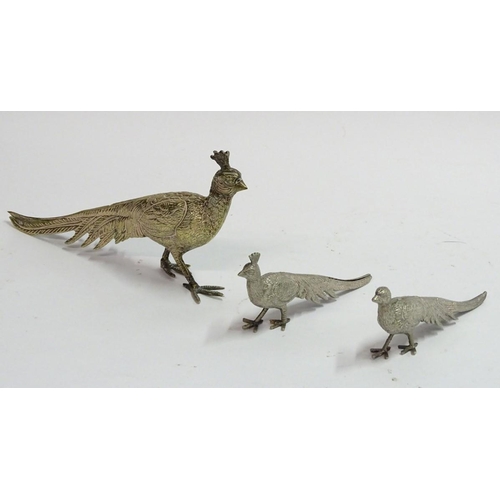 87 - A silverplate peacock place card holder, 8 3/4'' long. Together with a pair of smaller silver plate ... 