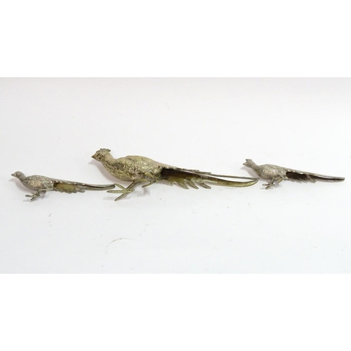 87 - A silverplate peacock place card holder, 8 3/4'' long. Together with a pair of smaller silver plate ... 