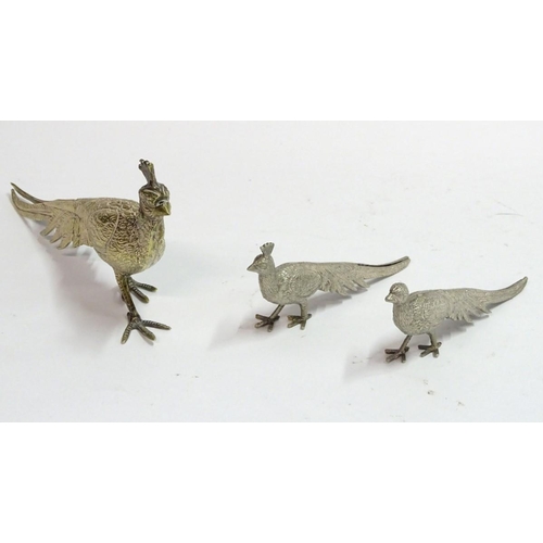 87 - A silverplate peacock place card holder, 8 3/4'' long. Together with a pair of smaller silver plate ... 