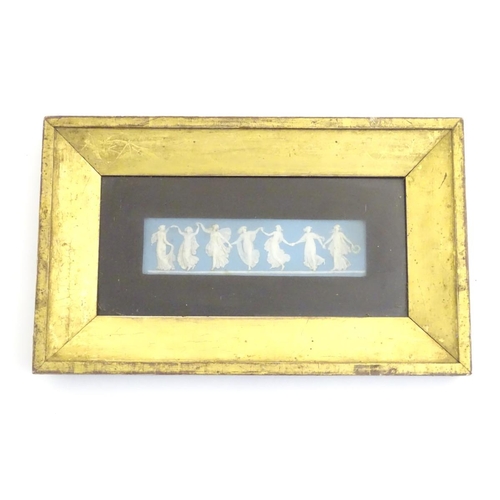 29 - A framed Wedgwood Jasperware bas relief plaque depicting the Dancing Hours / the classical Horae, th... 