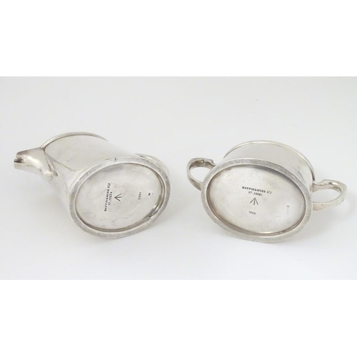 390 - Militaria: a silver plated cream jug and sugar bowl by Mappin & Webb, stamped 'KF.18074' (jug), KF.1... 