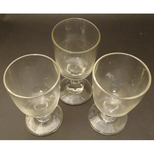 120 - Three assorted Georgian rummer pedestal drinking glasses, the tallest 5 7/8'' with a cut hexagonal s... 