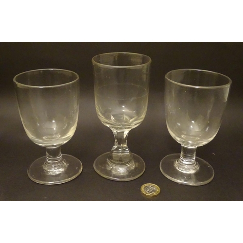 120 - Three assorted Georgian rummer pedestal drinking glasses, the tallest 5 7/8'' with a cut hexagonal s... 