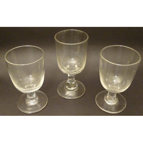 120 - Three assorted Georgian rummer pedestal drinking glasses, the tallest 5 7/8'' with a cut hexagonal s... 