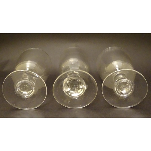 120 - Three assorted Georgian rummer pedestal drinking glasses, the tallest 5 7/8'' with a cut hexagonal s... 
