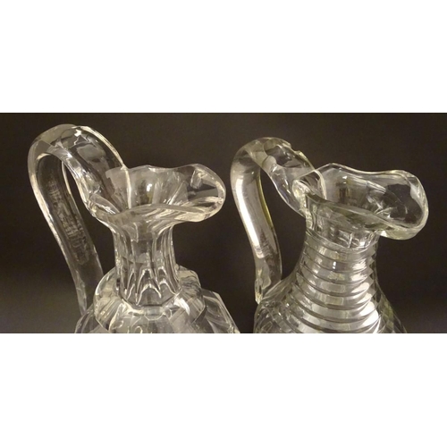 132 - Three assorted 19thC glass claret jugs, one with silver plate mounts. Tallest approx. 11 1/4'' high ... 