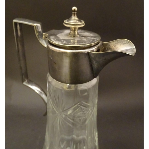 132 - Three assorted 19thC glass claret jugs, one with silver plate mounts. Tallest approx. 11 1/4'' high ... 