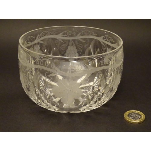 135 - A Victorian crystal glass rinser / finger bowl, decorated with etched fruiting vine, hobnail section... 