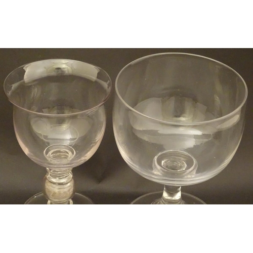145 - Two 19thC goblets, one with coin to knop. Largest approx. 6 1/2'' high x 4 1/2'' diameter (2)