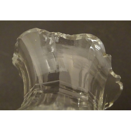 146 - An Irish glass water jug c.1800, together with a 19thC cut glass cream jug. Tallest approx. 9'' high... 