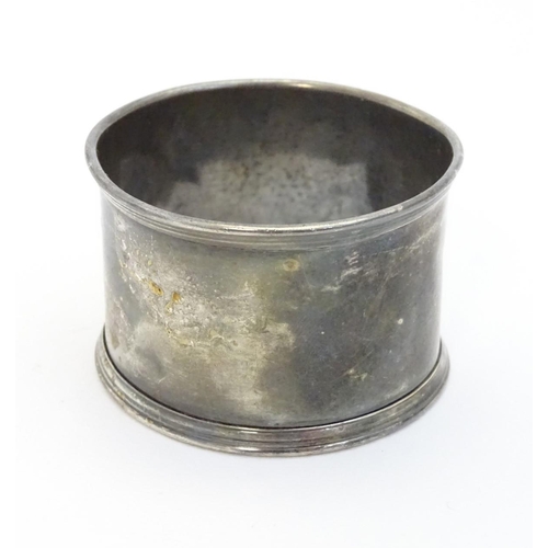 166 - A silver napkin ring hallmarked  London 1934 maker J W Benson Ltd.