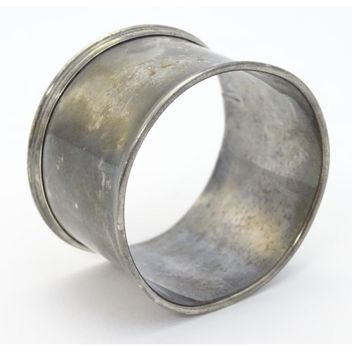 166 - A silver napkin ring hallmarked  London 1934 maker J W Benson Ltd.