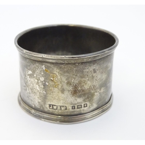 166 - A silver napkin ring hallmarked  London 1934 maker J W Benson Ltd.