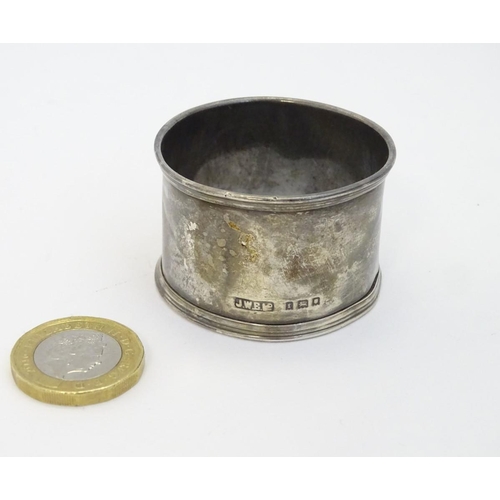 166 - A silver napkin ring hallmarked  London 1934 maker J W Benson Ltd.