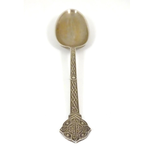 170 - A silver teaspoon with Celtic decoration and engraved M.L.G.C ( possibly Mount Lawley Golf Club ). H... 