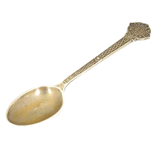 170 - A silver teaspoon with Celtic decoration and engraved M.L.G.C ( possibly Mount Lawley Golf Club ). H... 