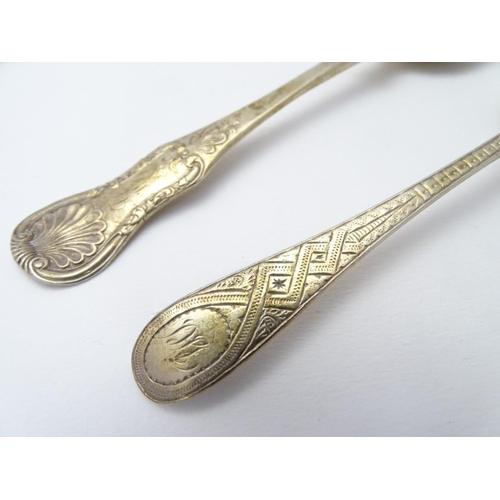 176 - A Victorian Scottish silver teaspoon with engraved decoration, hallmarked 1886, maker WS. Together w... 