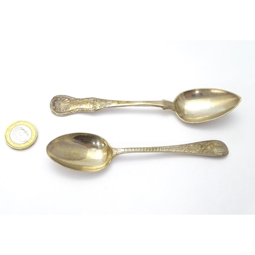 176 - A Victorian Scottish silver teaspoon with engraved decoration, hallmarked 1886, maker WS. Together w... 