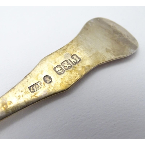176 - A Victorian Scottish silver teaspoon with engraved decoration, hallmarked 1886, maker WS. Together w... 