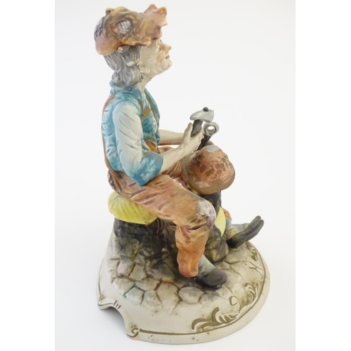 63 - A Capodimonte figure of an elderly man with tools, possibly an armourer. Indistinctly signed to base... 