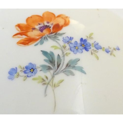 72 - A Continental lidded vase with hand painted floral decoration. Meissen style marks under. Approx. 9 ... 