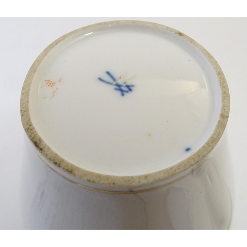 72 - A Continental lidded vase with hand painted floral decoration. Meissen style marks under. Approx. 9 ... 