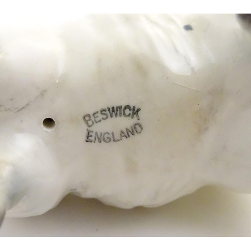 78 - A Beswick model of a sheep, model no. 935, together with a Beswick model of a recumbent shire foal, ... 