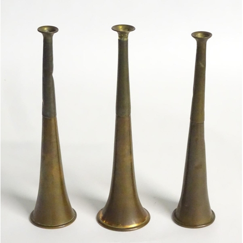 181 - Hunting: Three 20thC copper and brass hunting horns. The longest approx. 9'' long.
