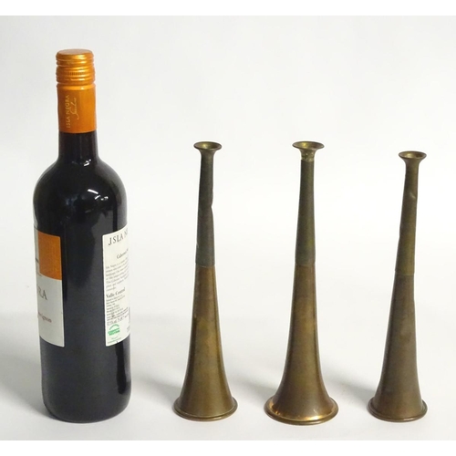 181 - Hunting: Three 20thC copper and brass hunting horns. The longest approx. 9'' long.