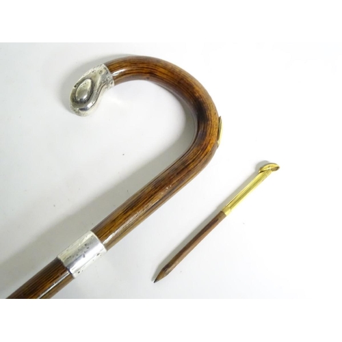 197A - A 20thC race-goer's peacock wood walking stick / cane with pencil insert to handle and silver mounts... 