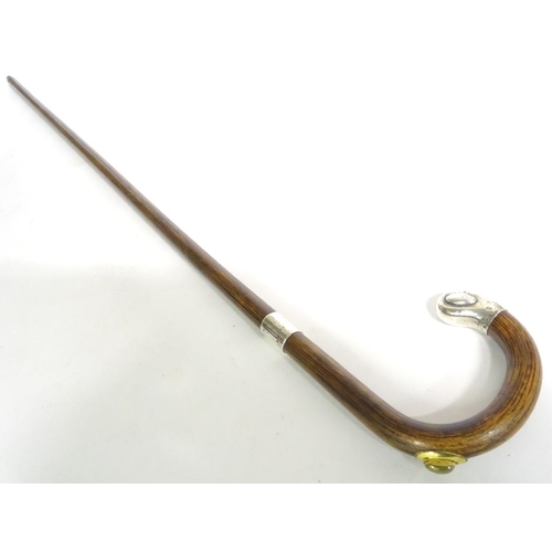 197A - A 20thC race-goer's peacock wood walking stick / cane with pencil insert to handle and silver mounts... 