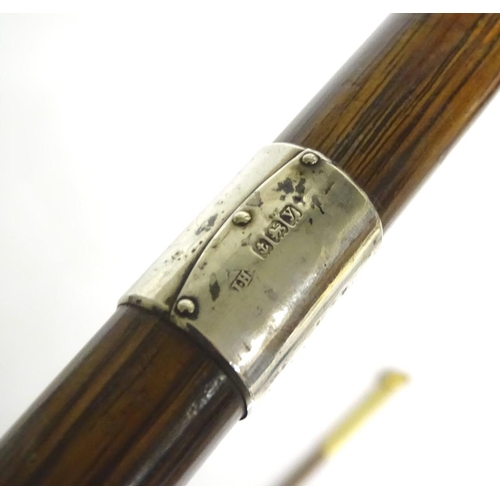 197A - A 20thC race-goer's peacock wood walking stick / cane with pencil insert to handle and silver mounts... 