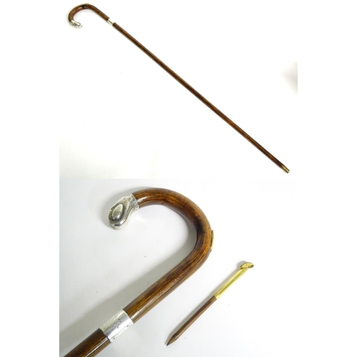 197A - A 20thC race-goer's peacock wood walking stick / cane with pencil insert to handle and silver mounts... 