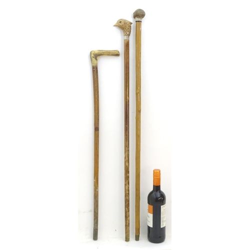 198A - Three late 20thC sticks / canes, comprising an antler handled example, one with the handle formed as... 