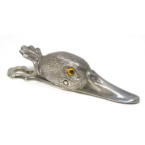 220 - A Novelty silver plate letter / paper clip formed as a duck head 5'' long